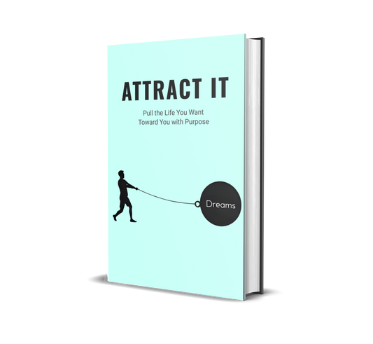 eBook titled 'Attract It' with a light blue background and a silhouette of a person pulling in his dreams.